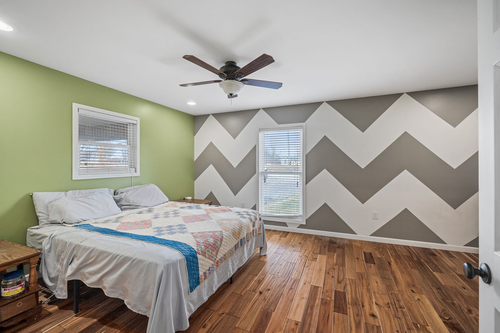 14525 Tucker Ridge Road Silver Point, TN 38582 - Photo 28 of 64 a bedroom with a bed and wooden floor