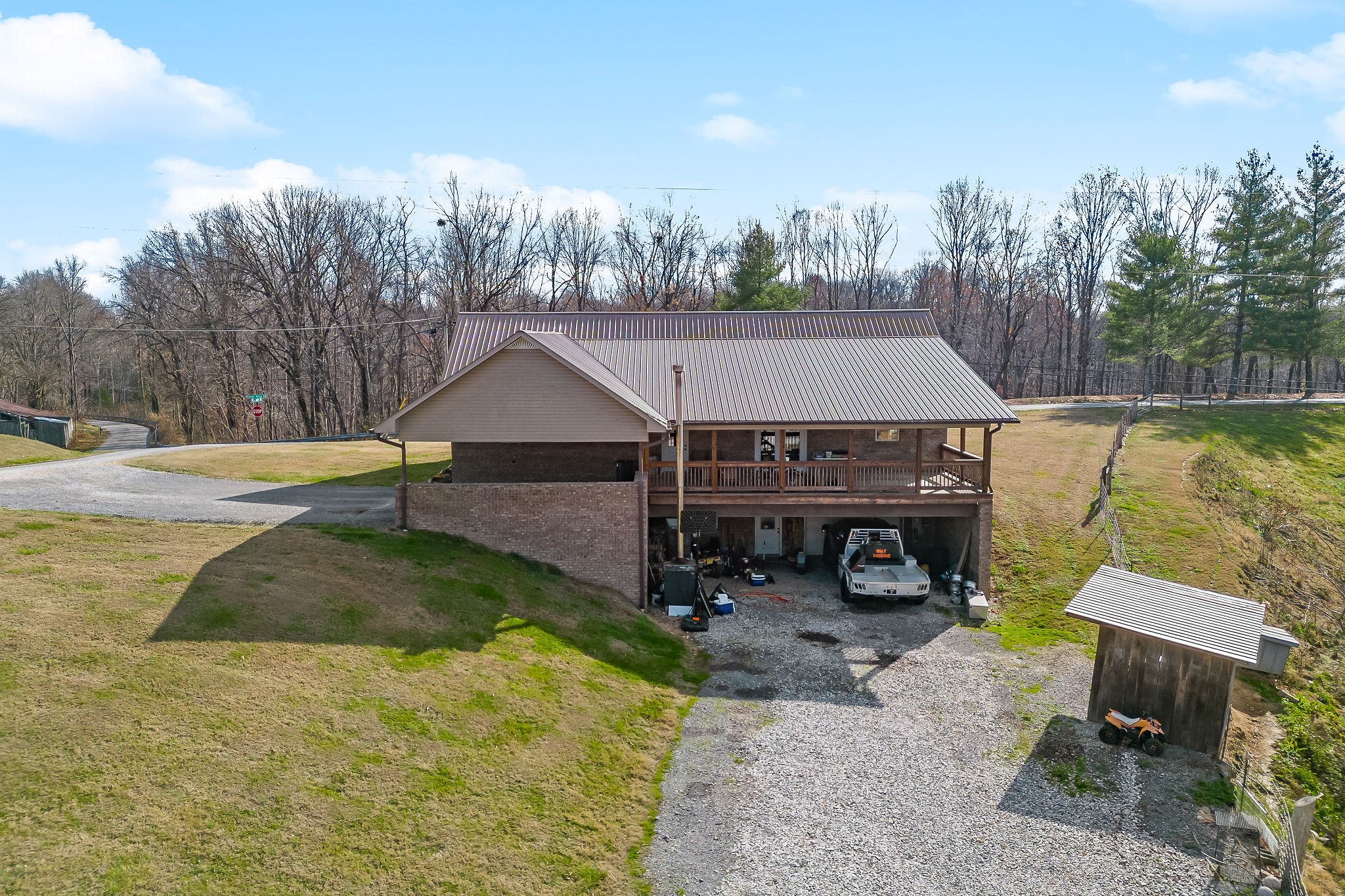 14525 Tucker Ridge Road Silver Point, TN 38582 - Photo 4 of 64 a view of a house with a yard and furniture