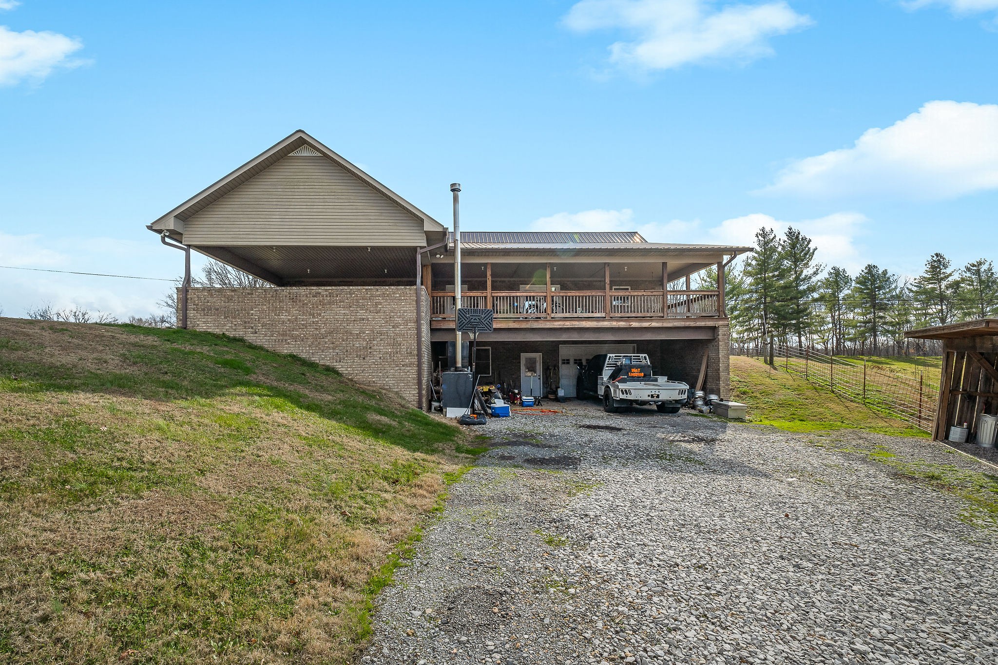 14525 Tucker Ridge Road Silver Point, TN 38582 - Photo 49 of 64 a front view of house with yard and outdoor seating