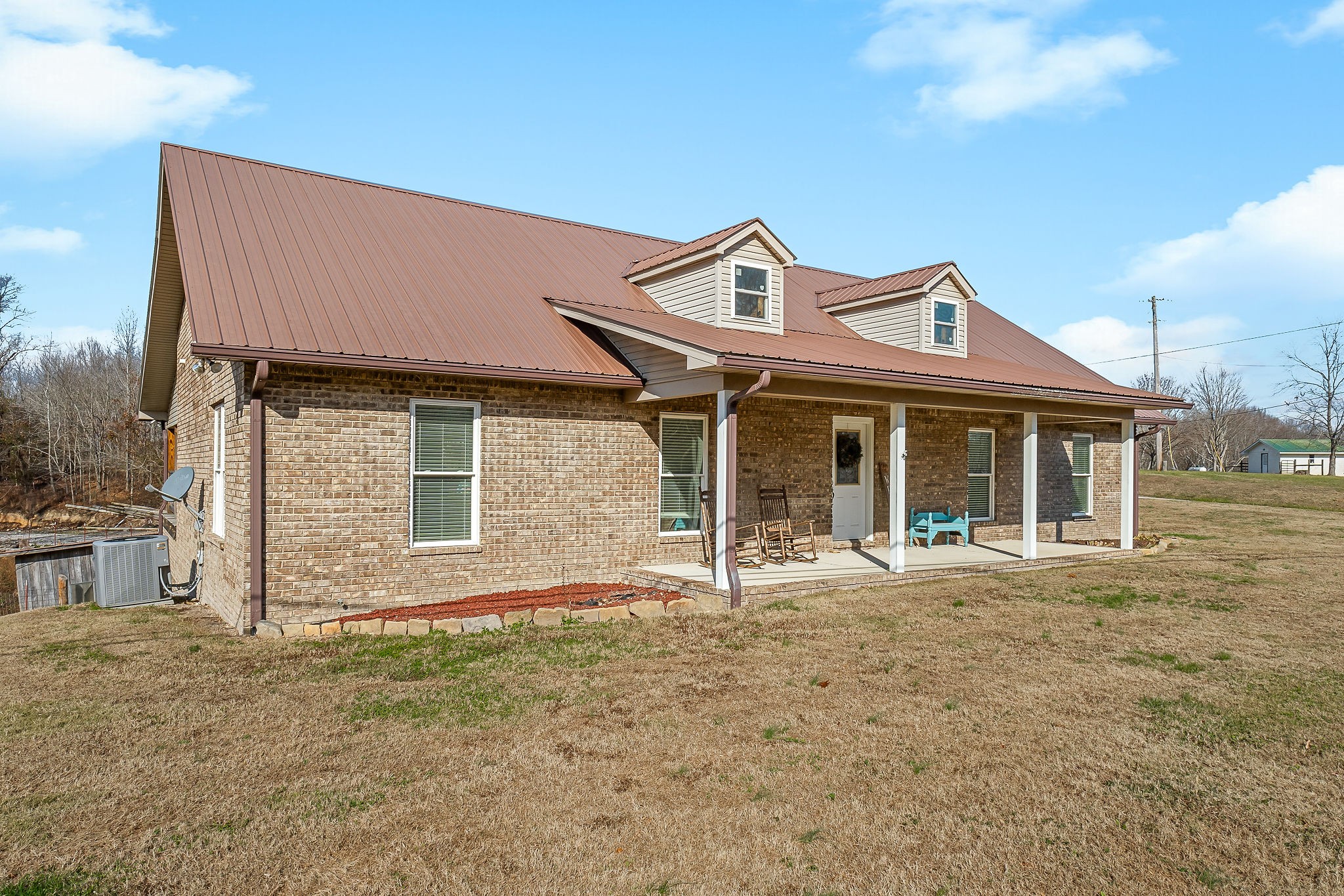 14525 Tucker Ridge Road Silver Point, TN 38582 - Photo 58 of 64 a front view of a house with garden