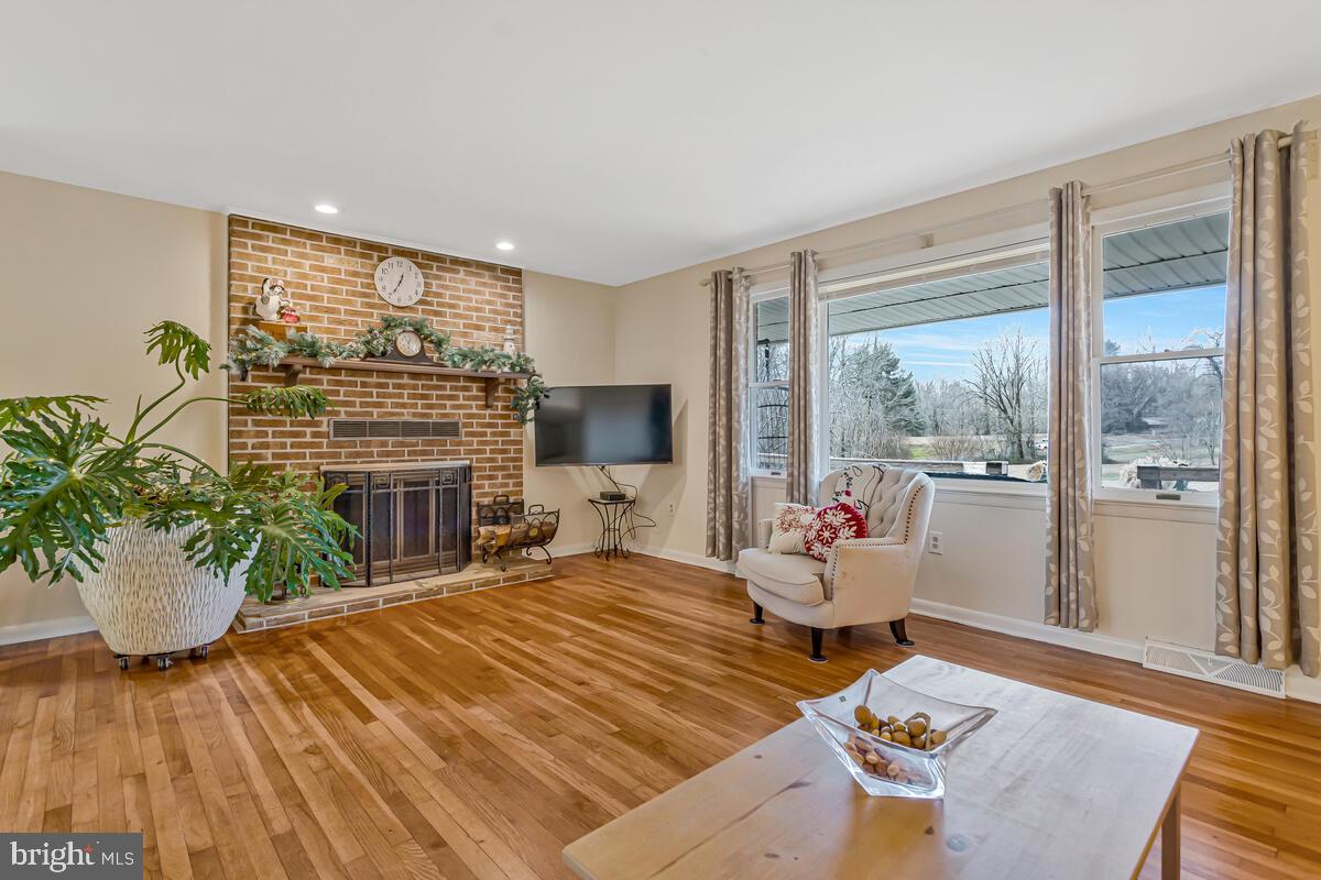 1921 Haven Lane Dunkirk, MD 20754 - Photo 12 of 64 a living room with furniture and garden view