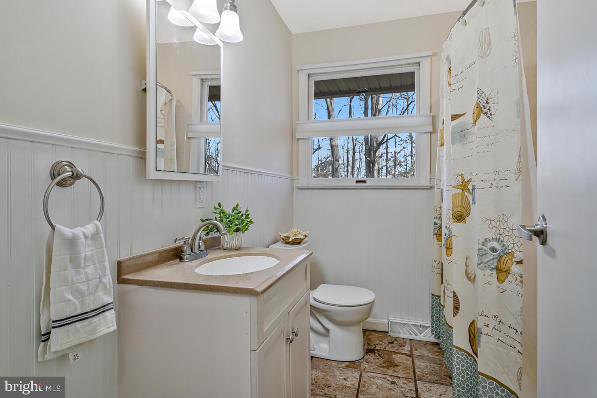 1921 Haven Lane Dunkirk, MD 20754 - Photo 20 of 64 a bathroom with a sink a toilet and shower
