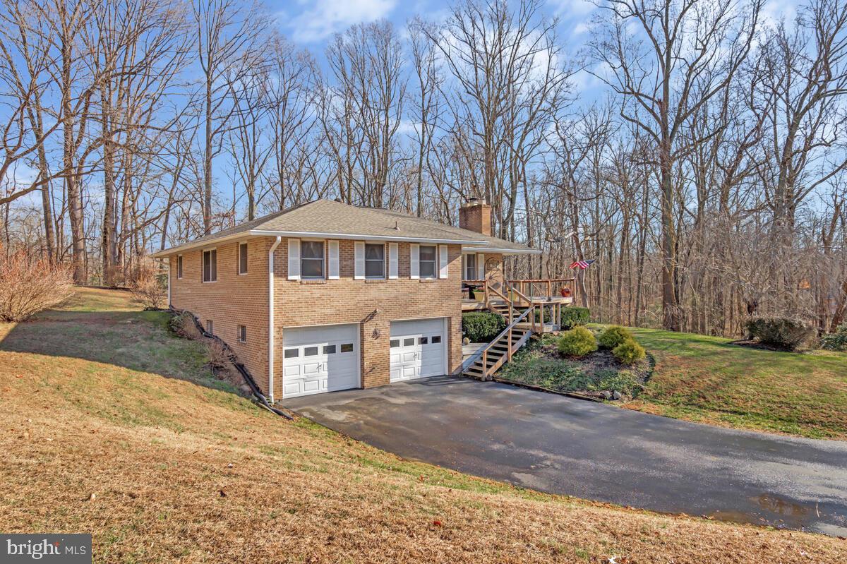 1921 Haven Lane Dunkirk, MD 20754 - Photo 4 of 64 a view of a house with a yard next to a road