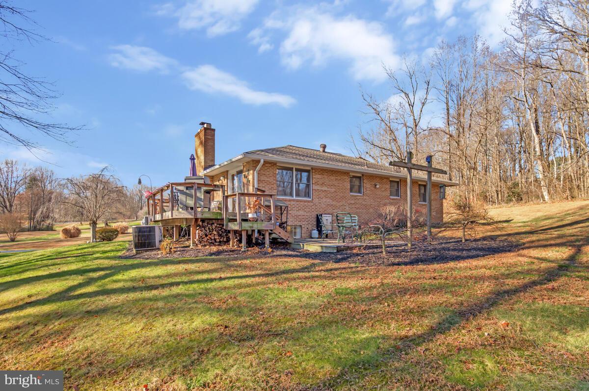 1921 Haven Lane Dunkirk, MD 20754 - Photo 41 of 64 a view of a house with a big yard and large trees