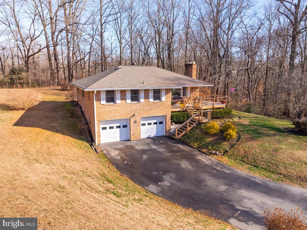 1921 Haven Lane Dunkirk, MD 20754 - Photo 45 of 64 a front view of a house with garden