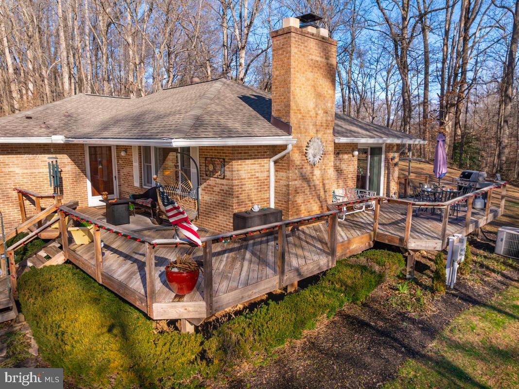 1921 Haven Lane Dunkirk, MD 20754 - Photo 47 of 64 a view of a house with backyard water fountain and sitting area