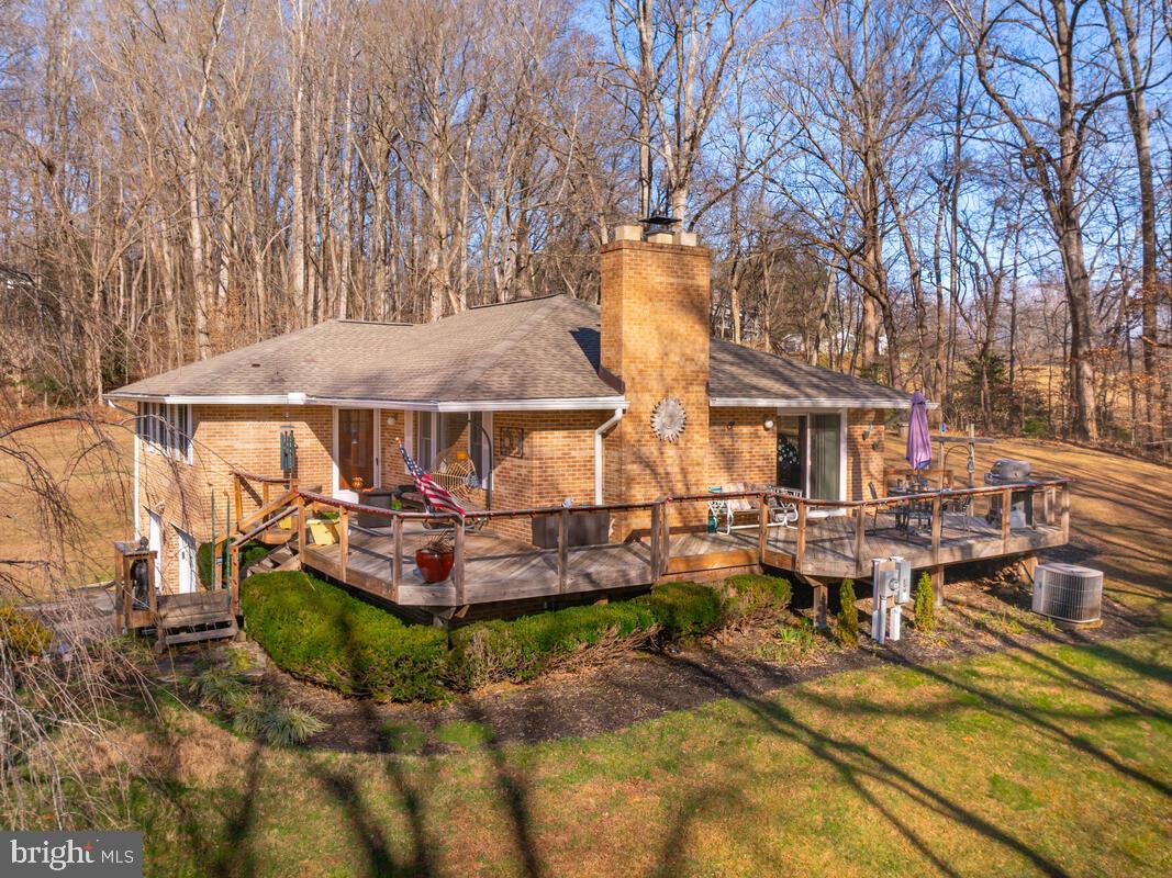 1921 Haven Lane Dunkirk, MD 20754 - Photo 48 of 64 a view of a patio with table and chairs with wooden fence