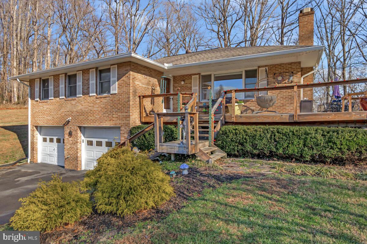 1921 Haven Lane Dunkirk, MD 20754 - Photo 5 of 64 a front view of a house with garden