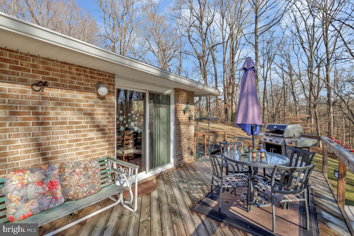 1921 Haven Lane Dunkirk, MD 20754 - Photo 8 of 64 a view of a patio with table and chairs and potted plants