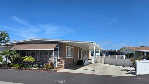 a front view of a house with a porch