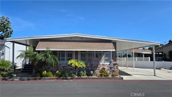 front view of a house with a patio