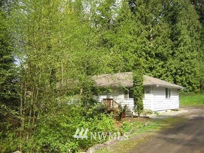 2727 Gibson Road, Unit A&B Everett, WA 98204 - Photo 1 of 1 a view of a house with a tree
