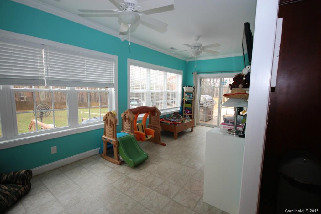 1659 Pine Bluff Court Fort Mill, SC 29708 - Photo 4 of 16 a living room with furniture and a large window