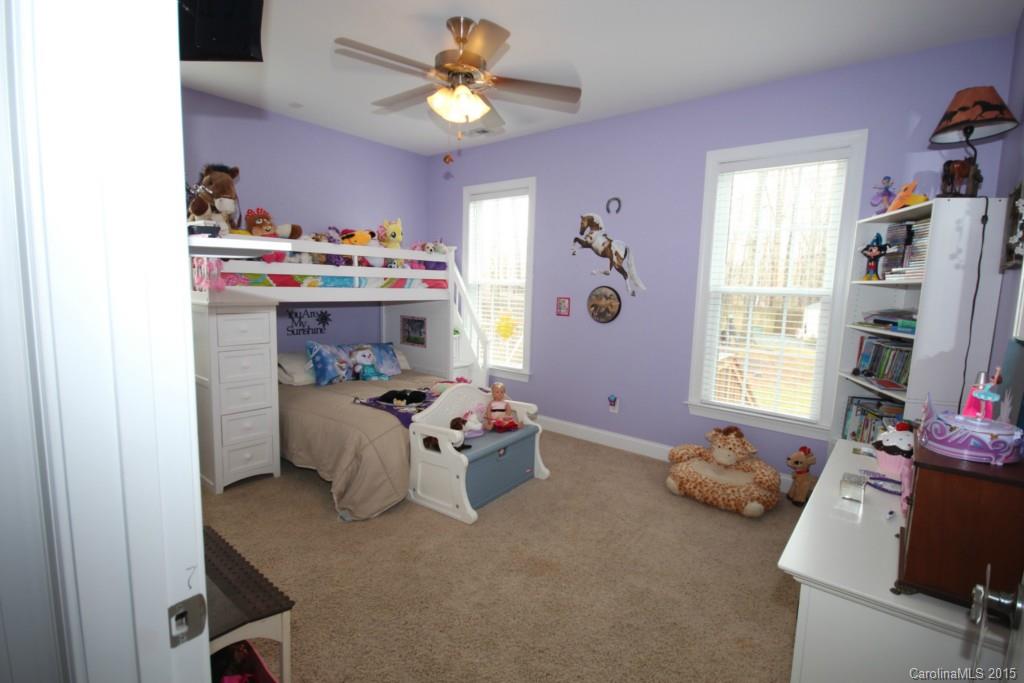 1659 Pine Bluff Court Fort Mill, SC 29708 - Photo 9 of 16 a living room with furniture toys and a window