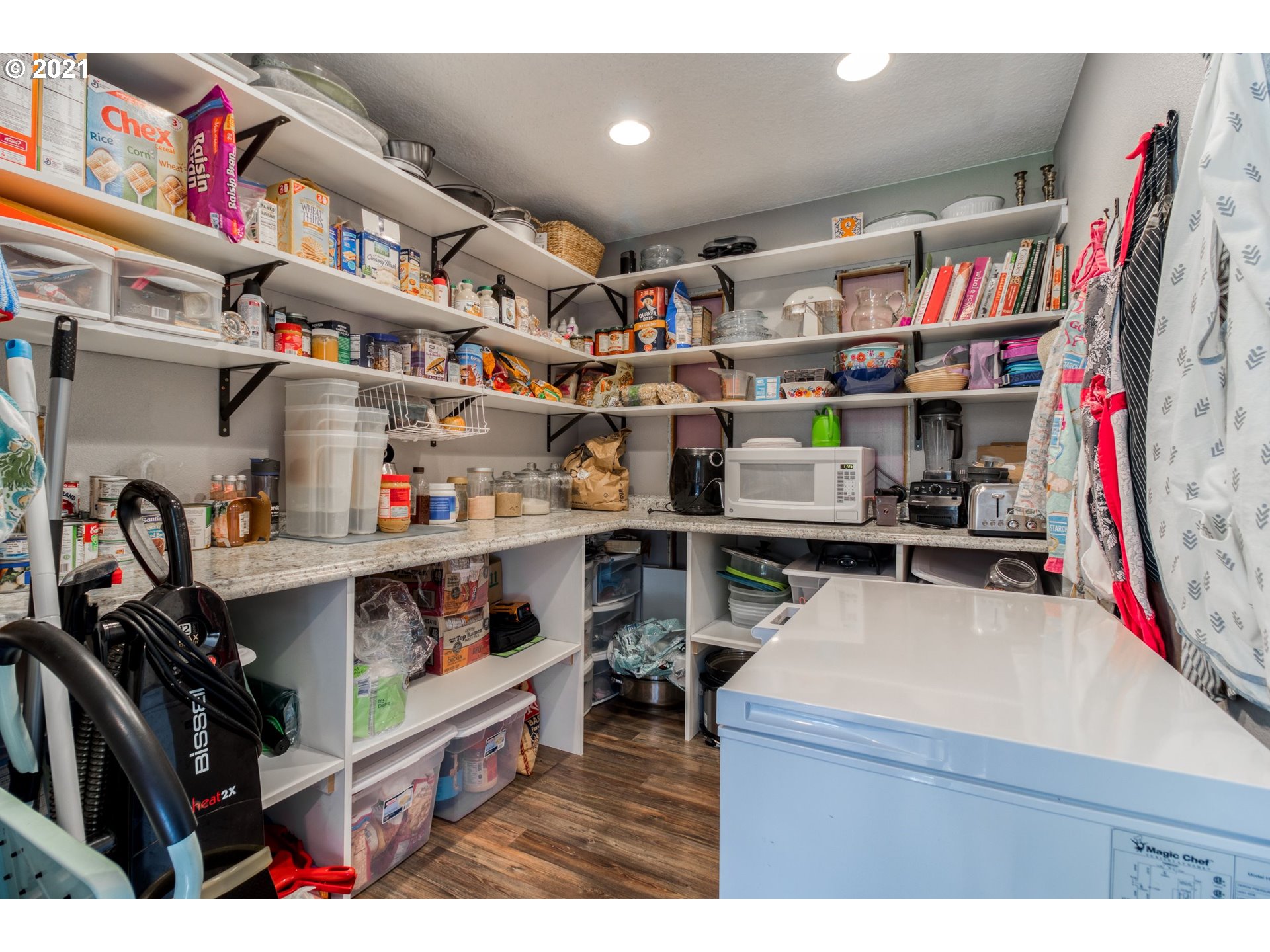 1913 Northeast 199th Street Ridgefield, WA 98642 - Photo 12 of 30 a view of walk in closet with clothes and shoes