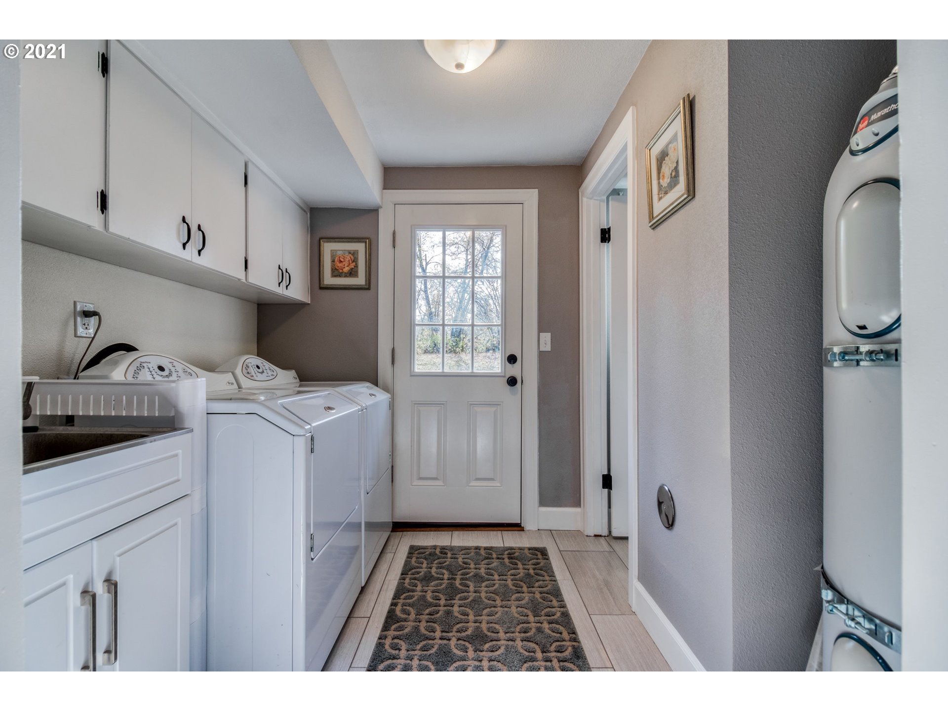 1913 Northeast 199th Street Ridgefield, WA 98642 - Photo 23 of 30 a utility room with closet dryer and washer