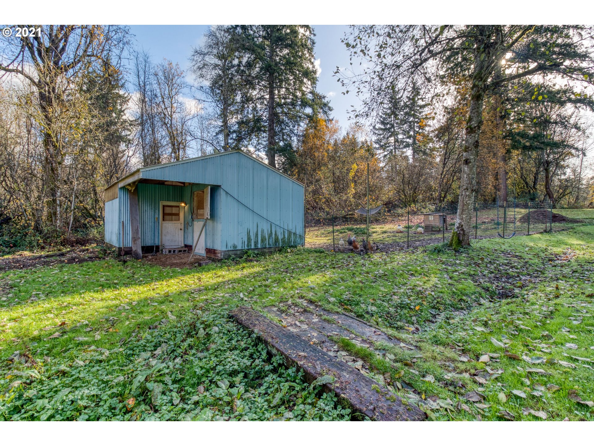 1913 Northeast 199th Street Ridgefield, WA 98642 - Photo 28 of 30 a backyard of a house with lots of green space