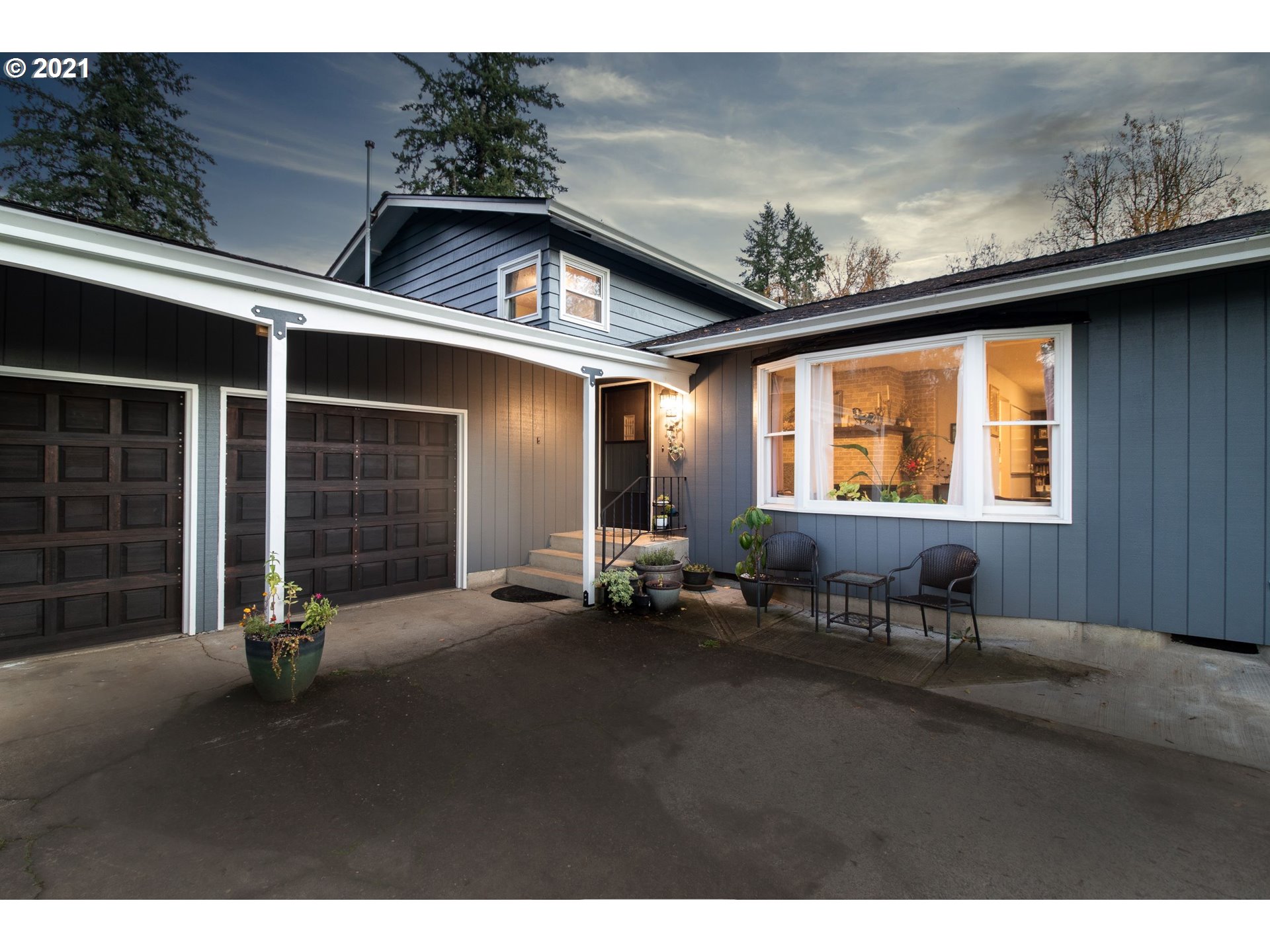 1913 Northeast 199th Street Ridgefield, WA 98642 - Photo 4 of 30 a backyard of a house with yard and seating space