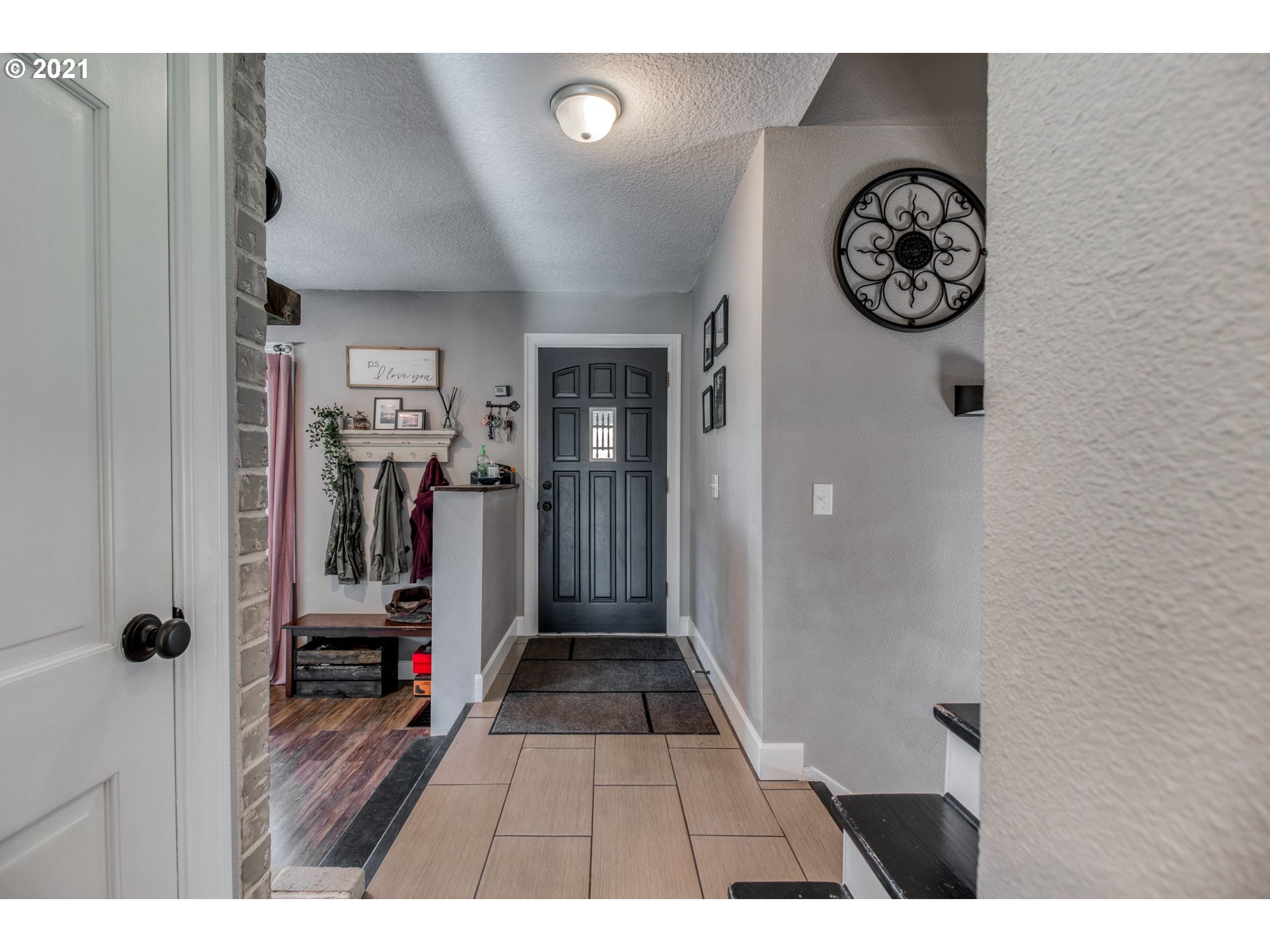 1913 Northeast 199th Street Ridgefield, WA 98642 - Photo 5 of 30 a view of entryway with wooden floor