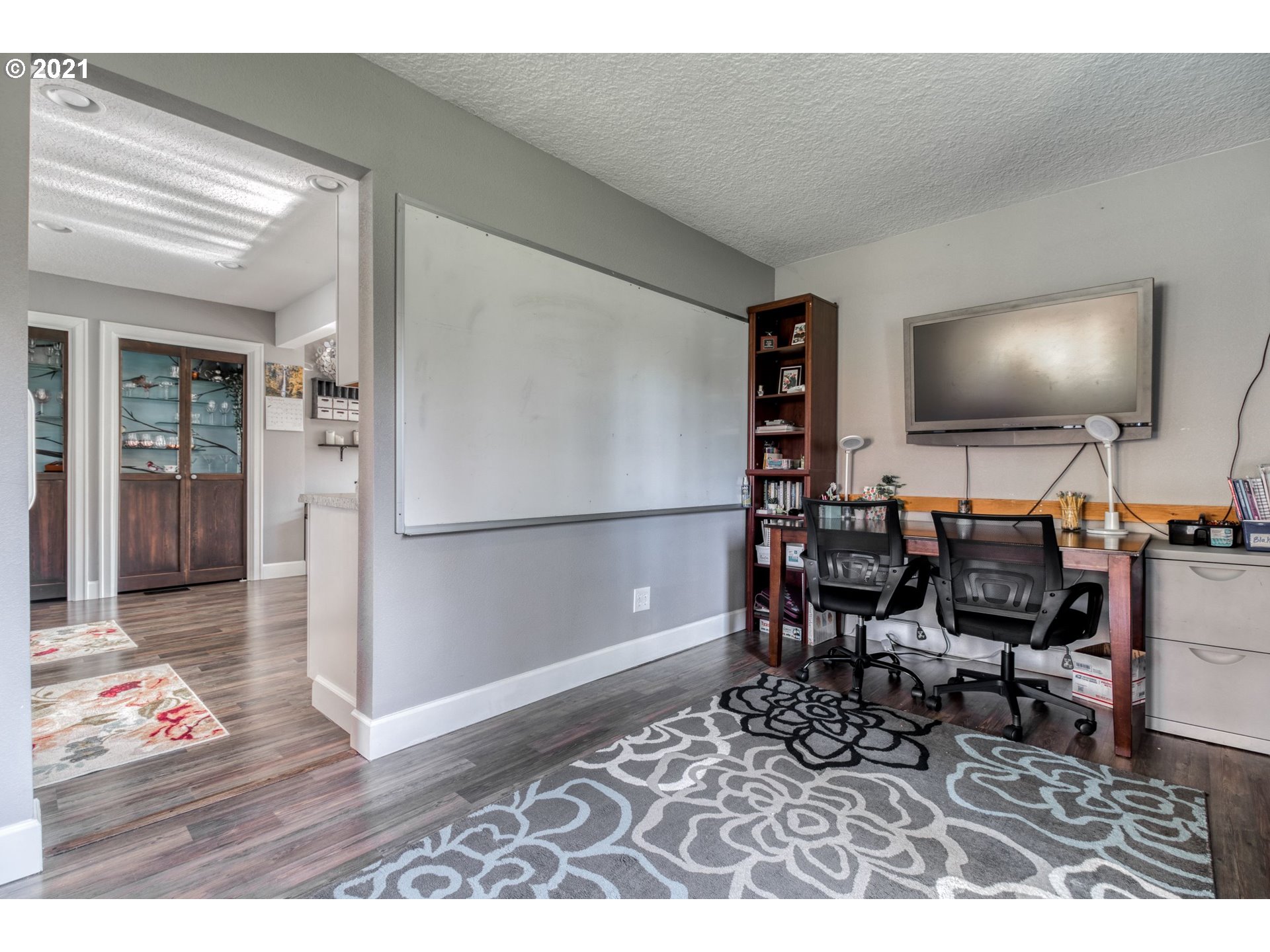 1913 Northeast 199th Street Ridgefield, WA 98642 - Photo 7 of 30 a living room with furniture and wooden floor
