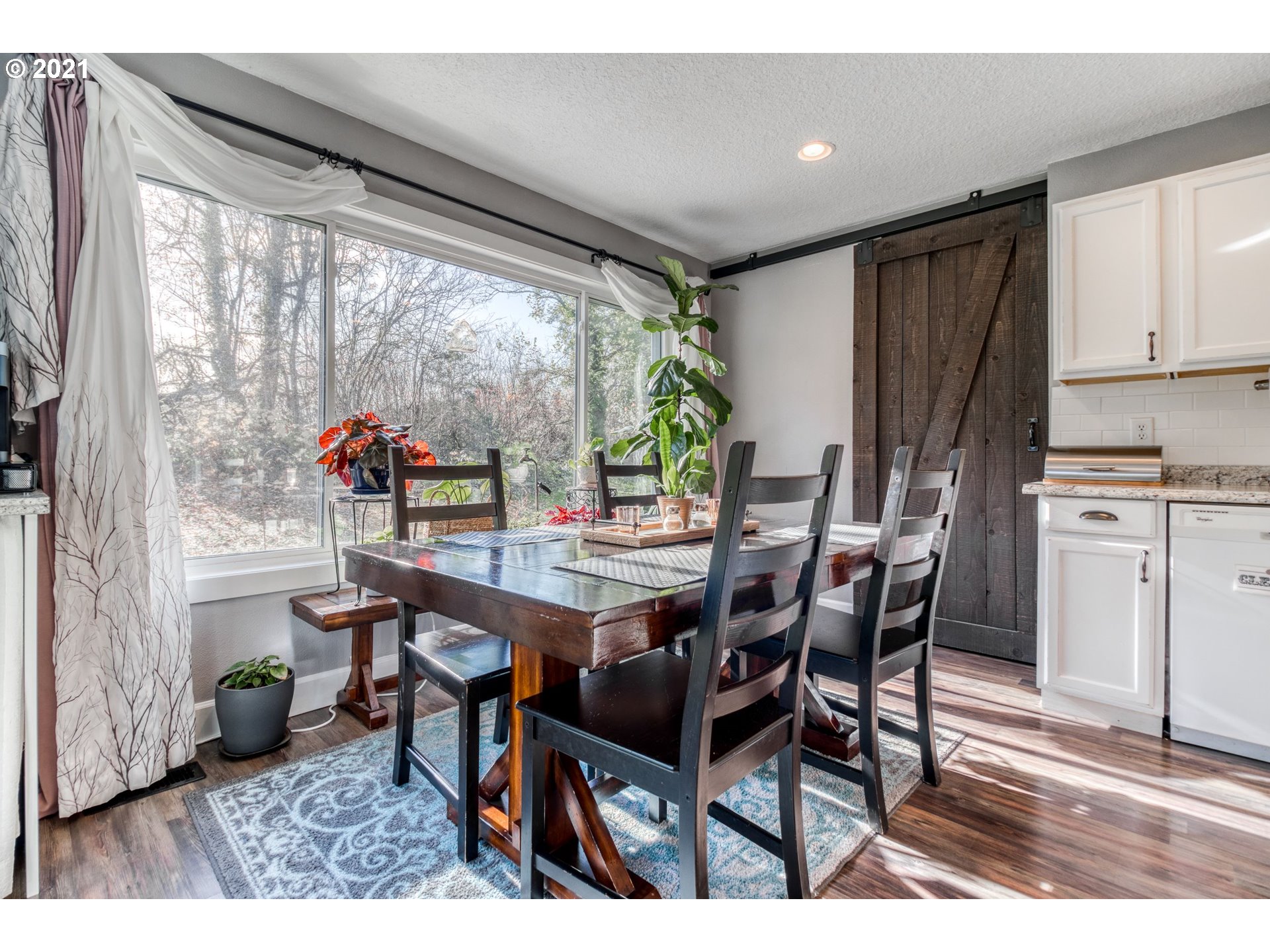 1913 Northeast 199th Street Ridgefield, WA 98642 - Photo 10 of 30 a view of a dining room with furniture window and outside view