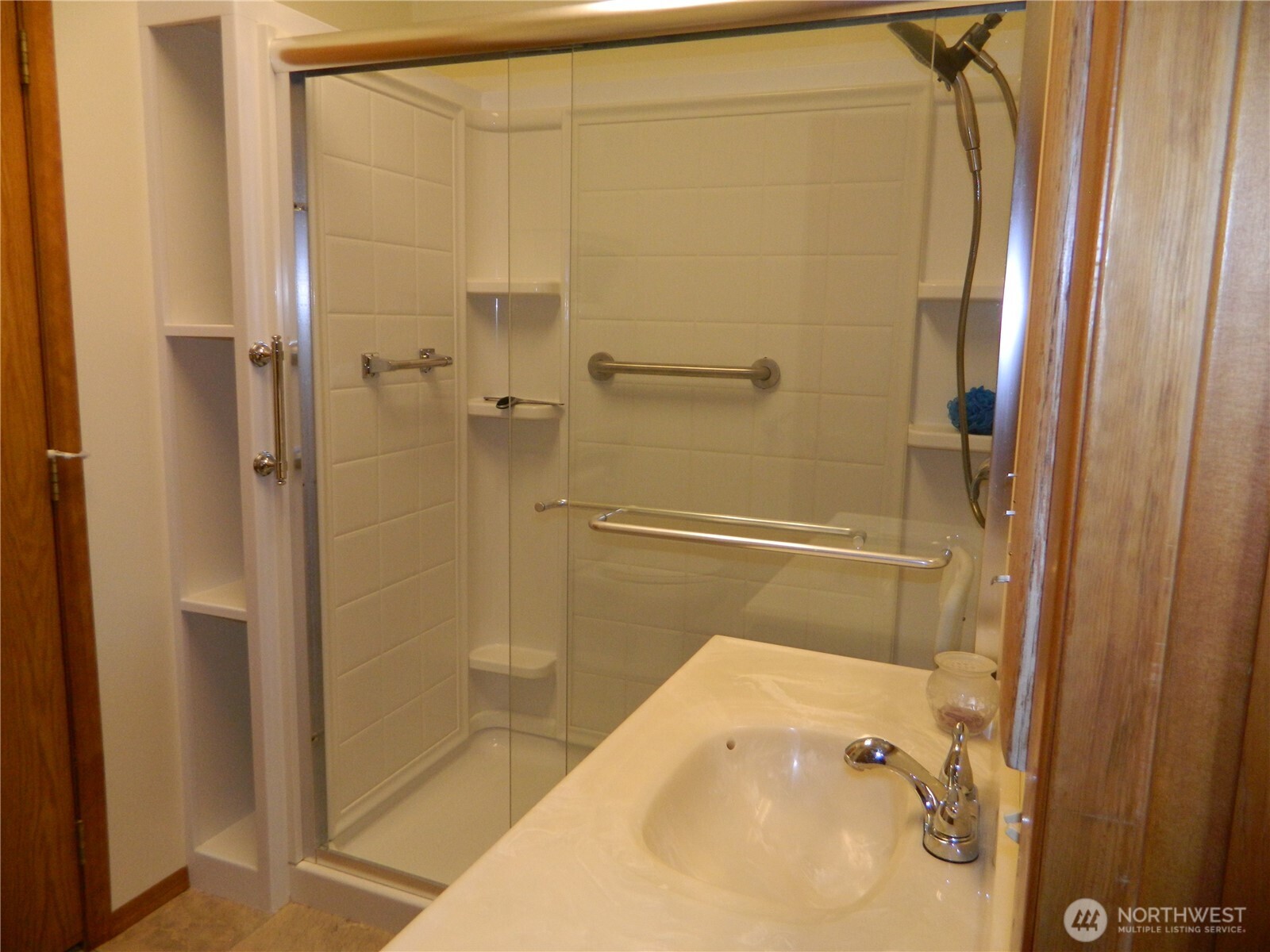 19 3rd Street Tonasket, WA 98855 - Photo 12 of 21 a bathroom with a tub and a shower