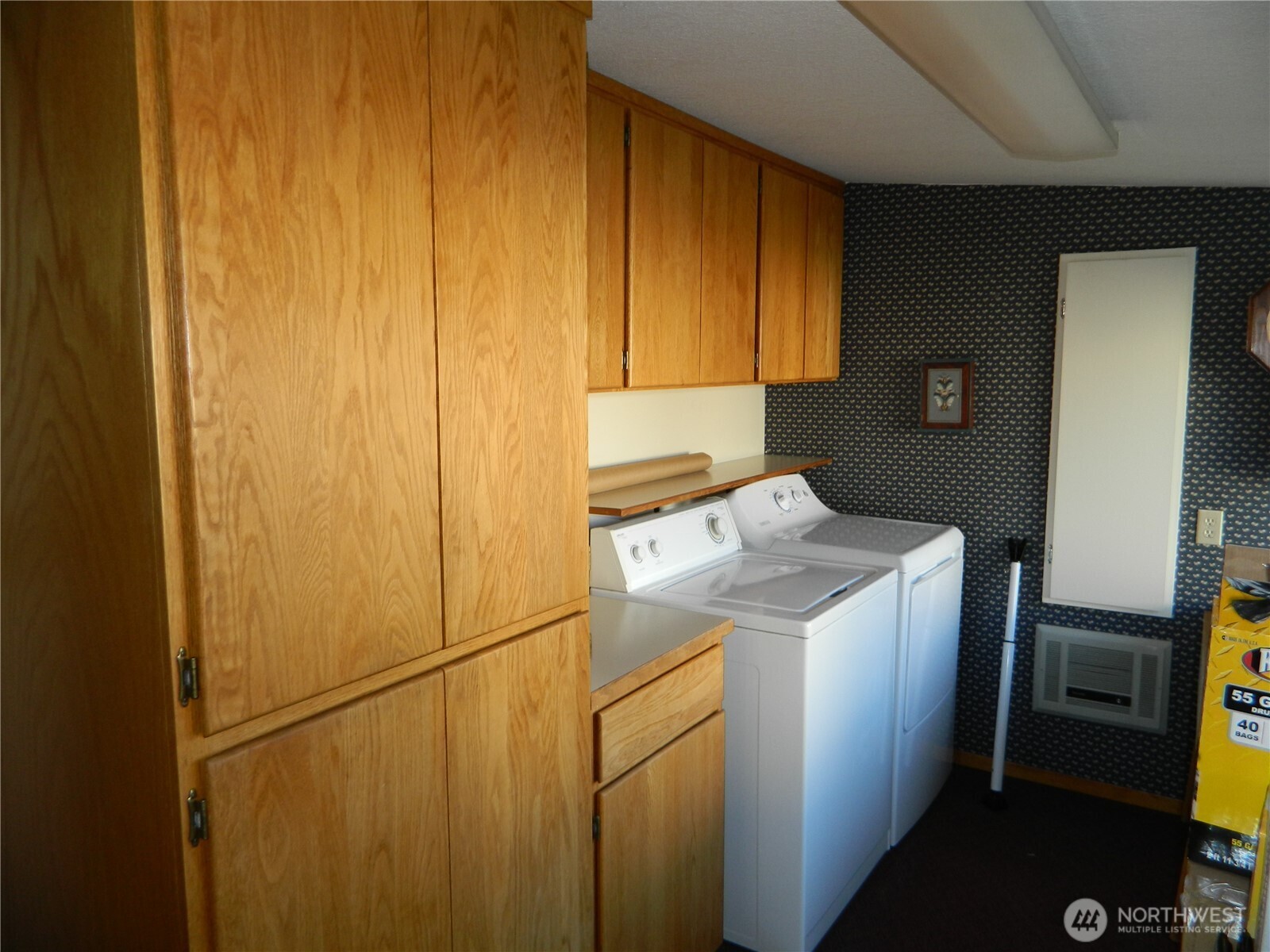 19 3rd Street Tonasket, WA 98855 - Photo 19 of 21 a utility room with dryer and washer