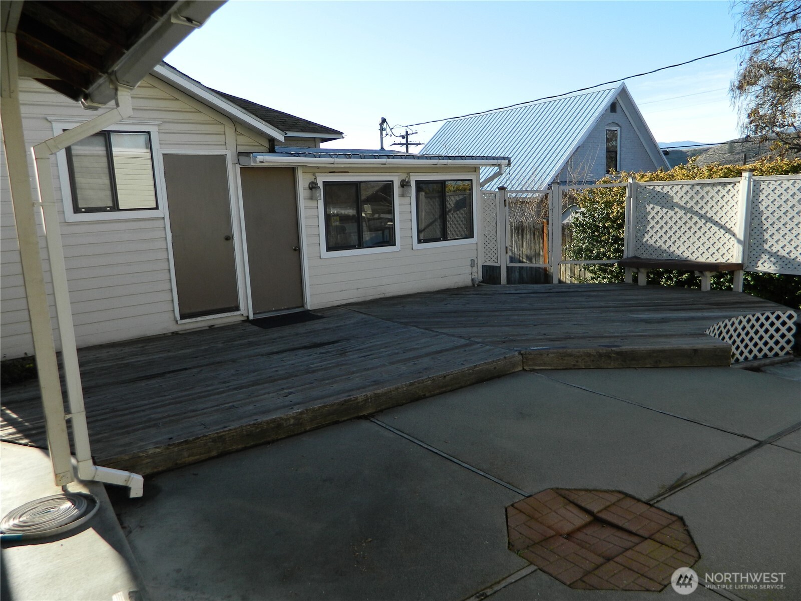 19 3rd Street Tonasket, WA 98855 - Photo 7 of 21 a front view of a house with a garage
