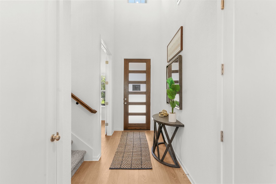 417 Raleigh Drive Georgetown, TX 78633 - Photo 23 of 40 a view of a livingroom with wooden floor and stairs