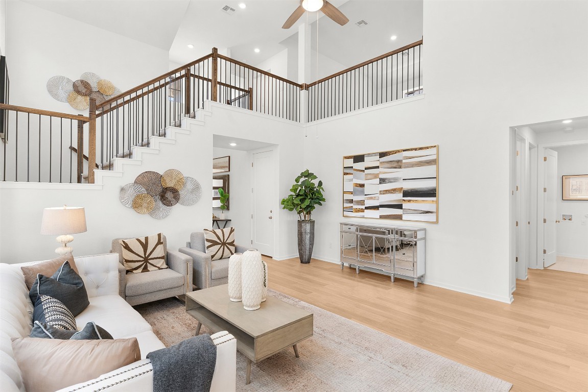 417 Raleigh Drive Georgetown, TX 78633 - Photo 27 of 40 a living room with furniture and wooden floor