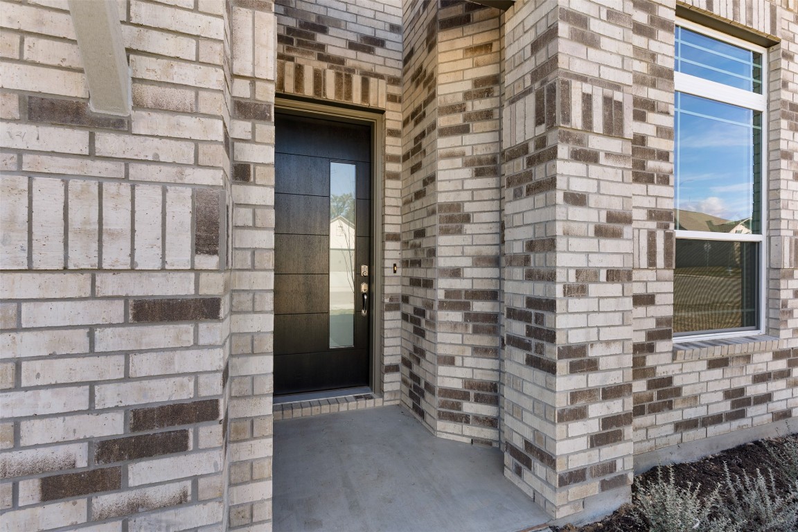 417 Raleigh Drive Georgetown, TX 78633 - Photo 2 of 29 Property entrance featuring brick siding