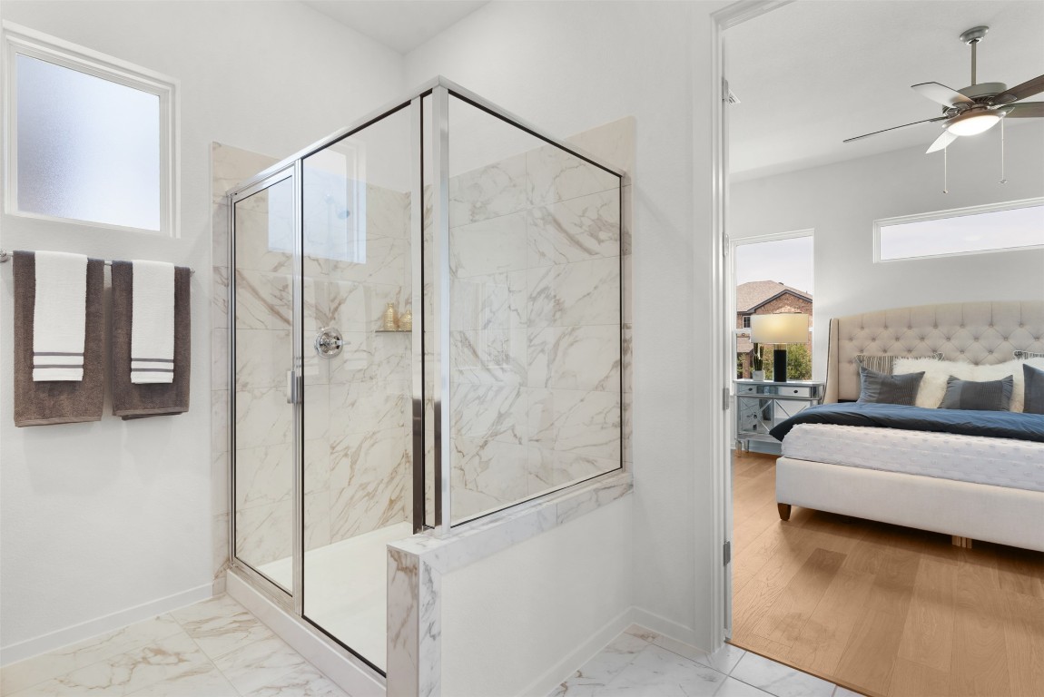 417 Raleigh Drive Georgetown, TX 78633 - Photo 33 of 40 a en suite spacious bathroom with a double vanity sink and shower