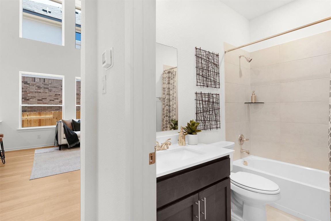 417 Raleigh Drive Georgetown, TX 78633 - Photo 37 of 40 a bathroom with a sink a toilet and a bathtub