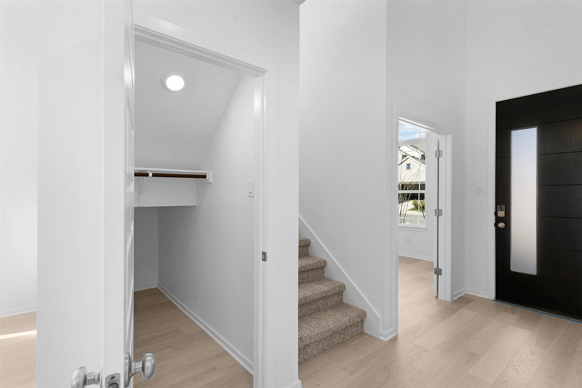 417 Raleigh Drive Georgetown, TX 78633 - Photo 3 of 29 Entrance foyer featuring light wood-style floors and stairs