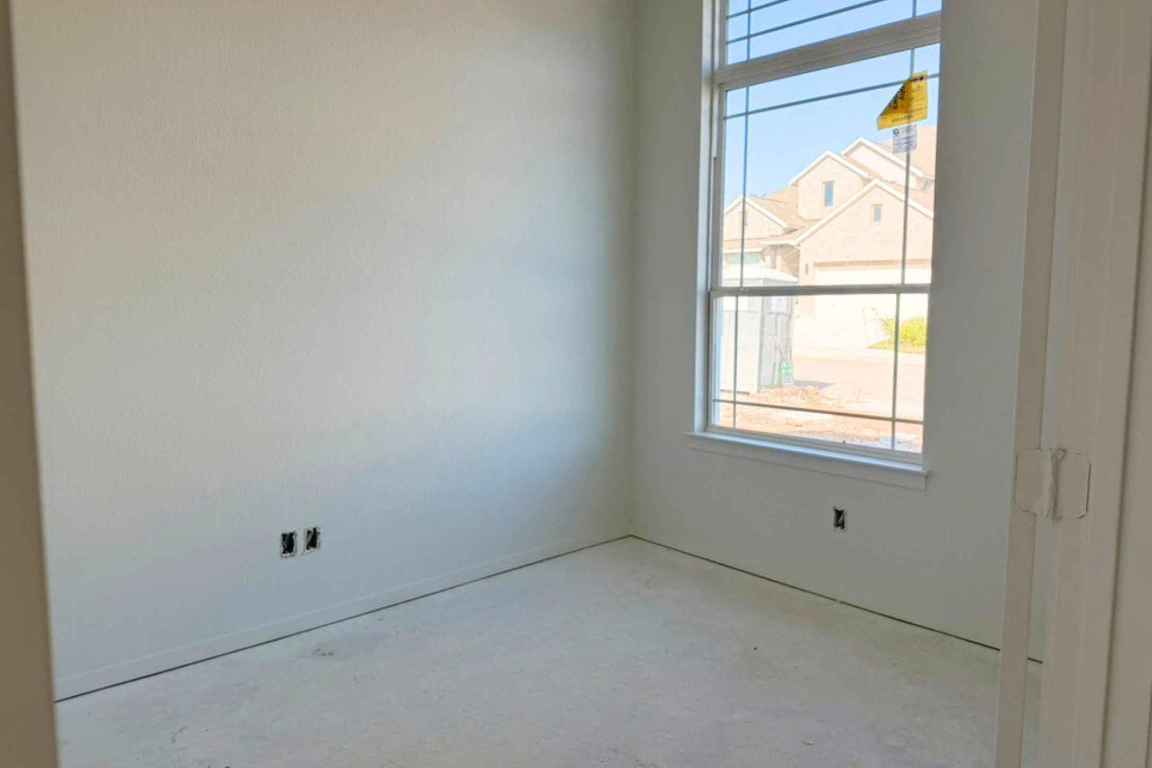 417 Raleigh Drive Georgetown, TX 78633 - Photo 3 of 40 a room view with a window