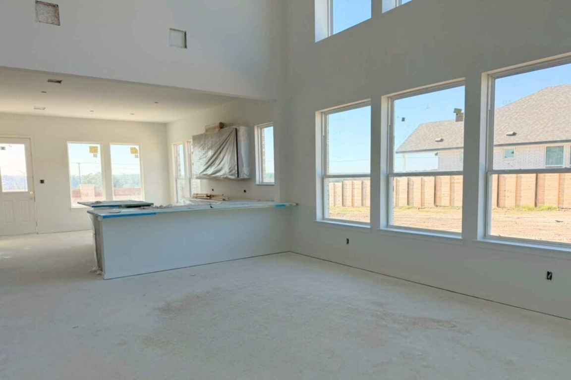 417 Raleigh Drive Georgetown, TX 78633 - Photo 4 of 40 a view of an empty room with a window