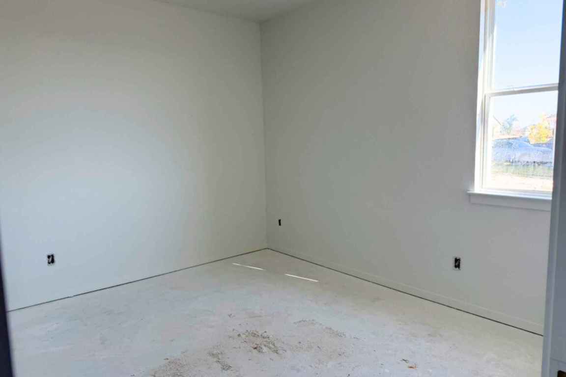 417 Raleigh Drive Georgetown, TX 78633 - Photo 8 of 40 an empty room with a window