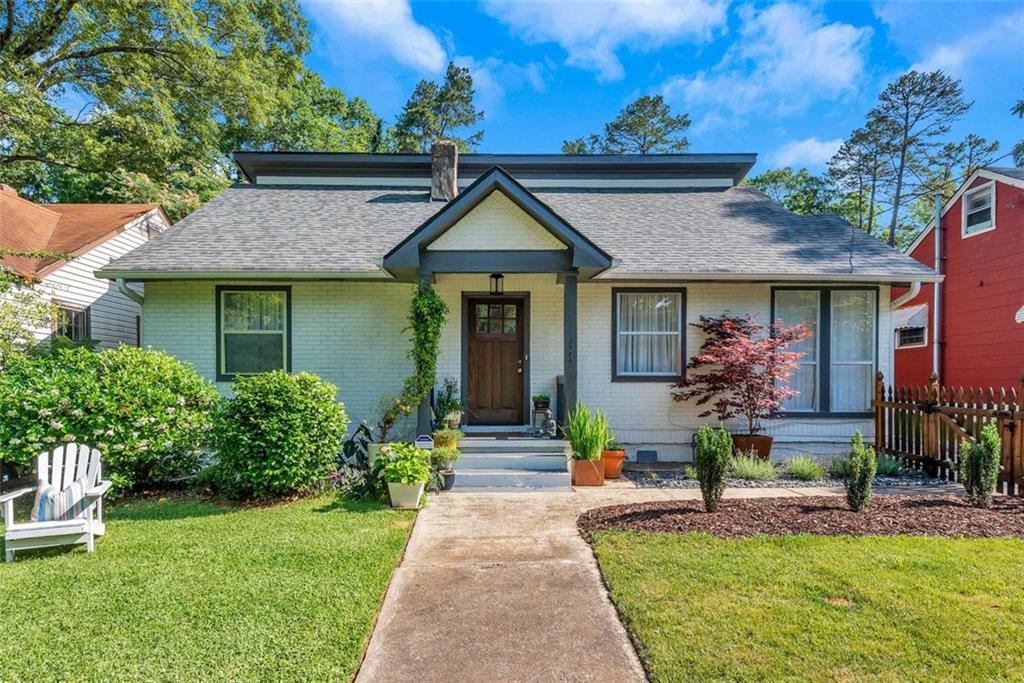 2464 Hillside Avenue Decatur, GA 30032 - Photo 1 of 1 a front view of a house with garden