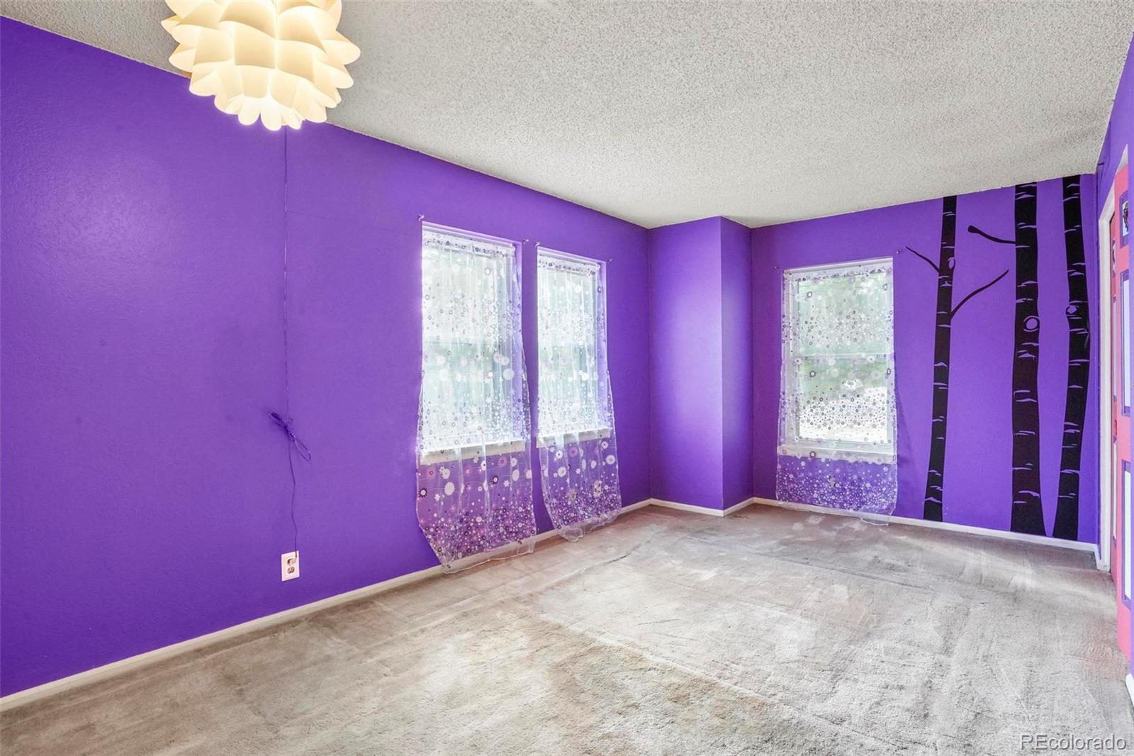 2 Acoma Street, Unit 1 Denver, CO 80223 - Photo 17 of 23 a view of a livingroom with a window