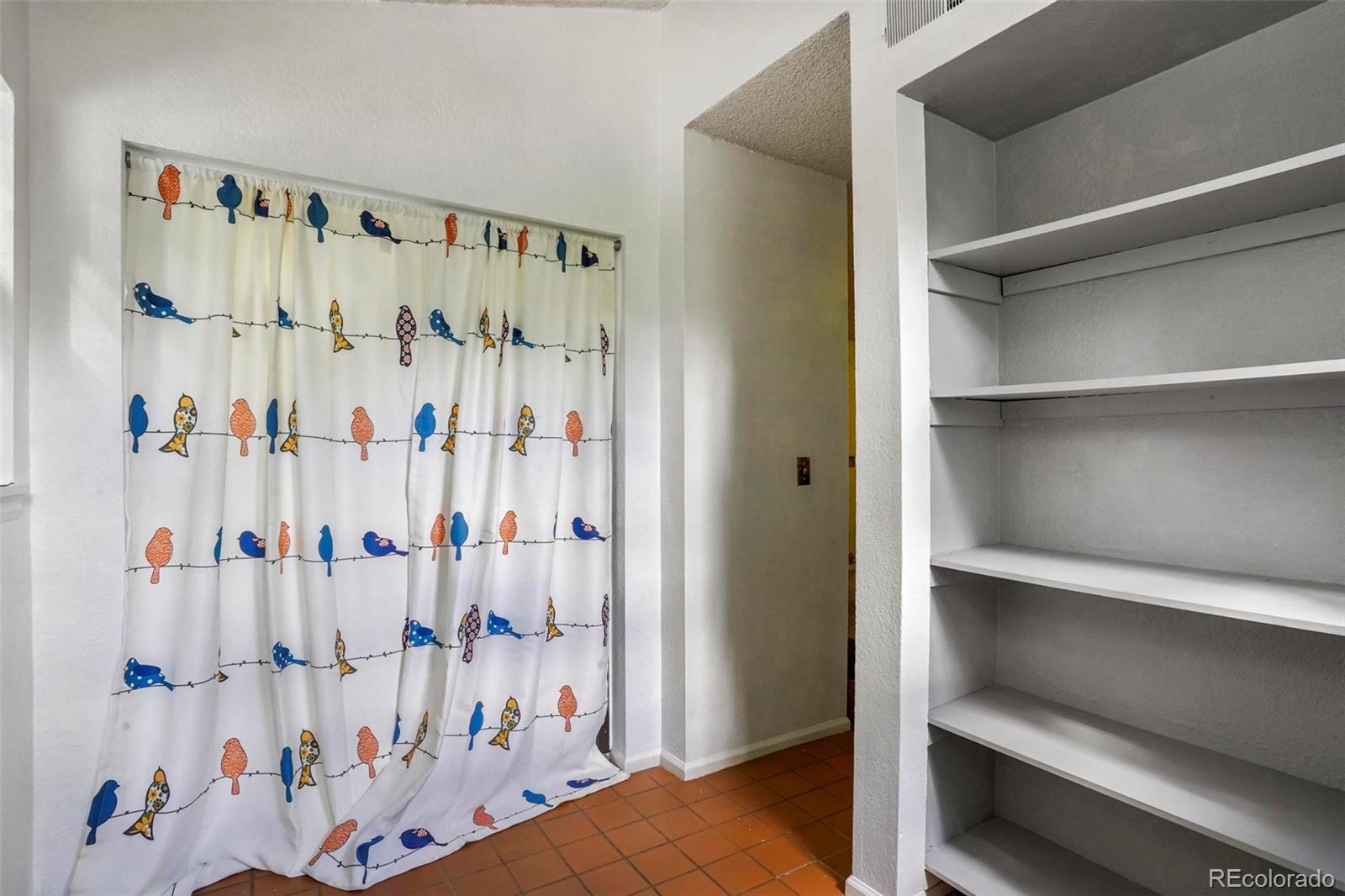 2 Acoma Street, Unit 1 Denver, CO 80223 - Photo 19 of 23 a view of a walk in closet