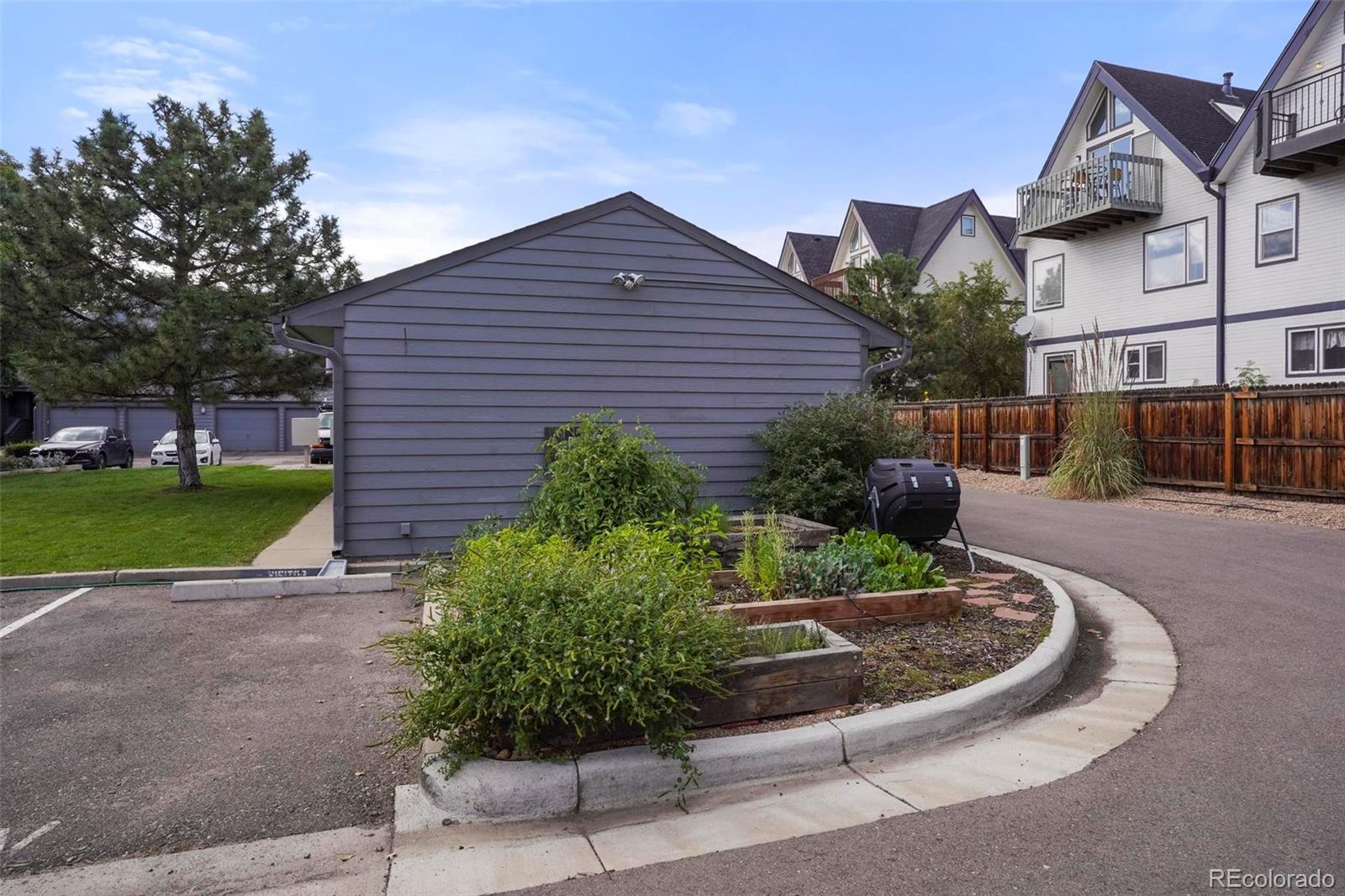 2 Acoma Street, Unit 1 Denver, CO 80223 - Photo 5 of 23 a view of a house with a garden