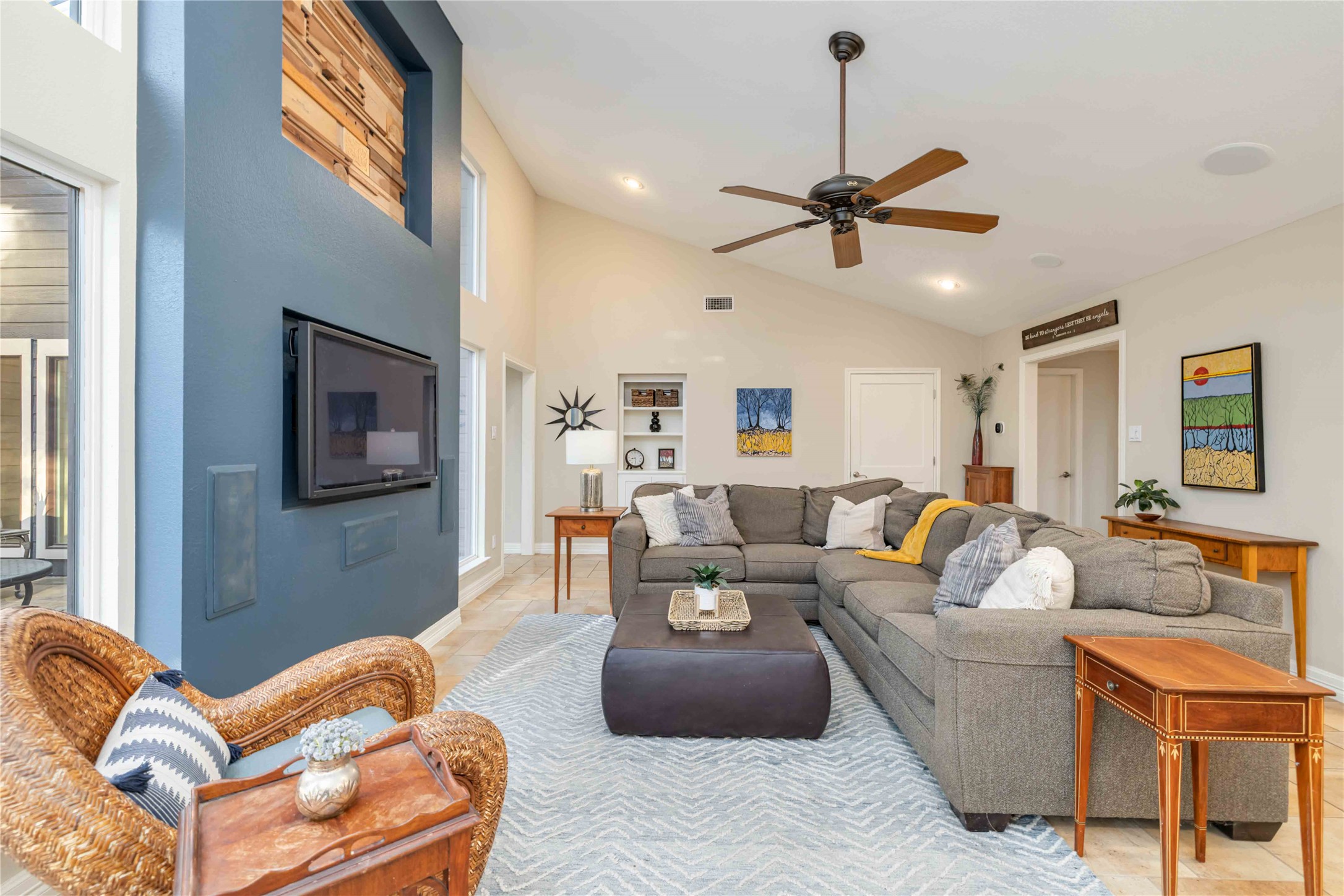 10903 Cade Circle Austin, TX 78726 - Photo 18 of 40 Living room featuring ceiling fan, vaulted ceiling, and recessed lighting