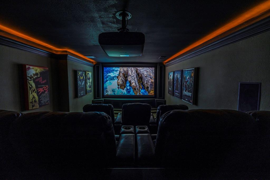 10903 Cade Circle Austin, TX 78726 - Photo 23 of 40 Home theater with crown molding and a textured ceiling