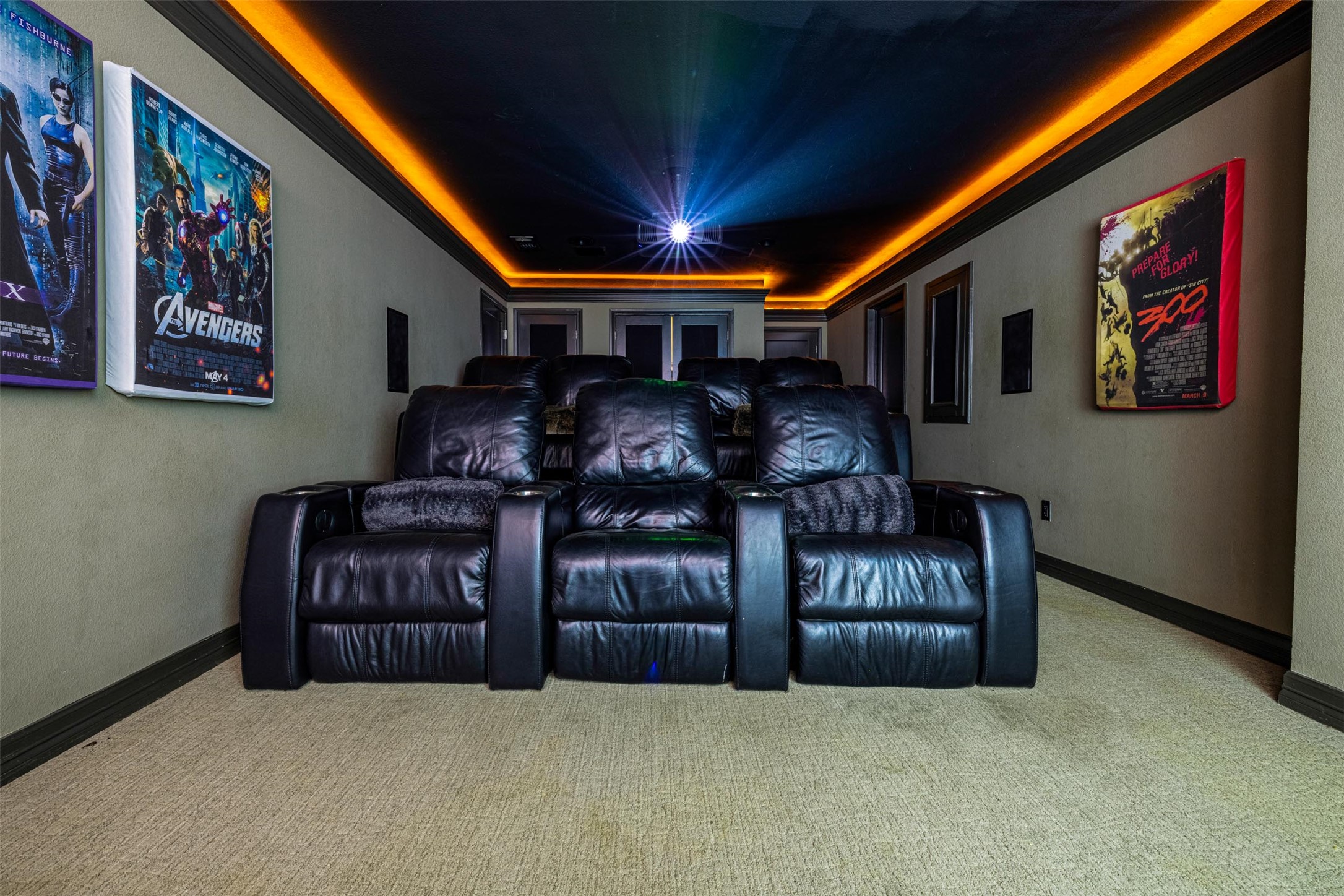 10903 Cade Circle Austin, TX 78726 - Photo 24 of 40 Home theater room featuring light colored carpet and baseboards