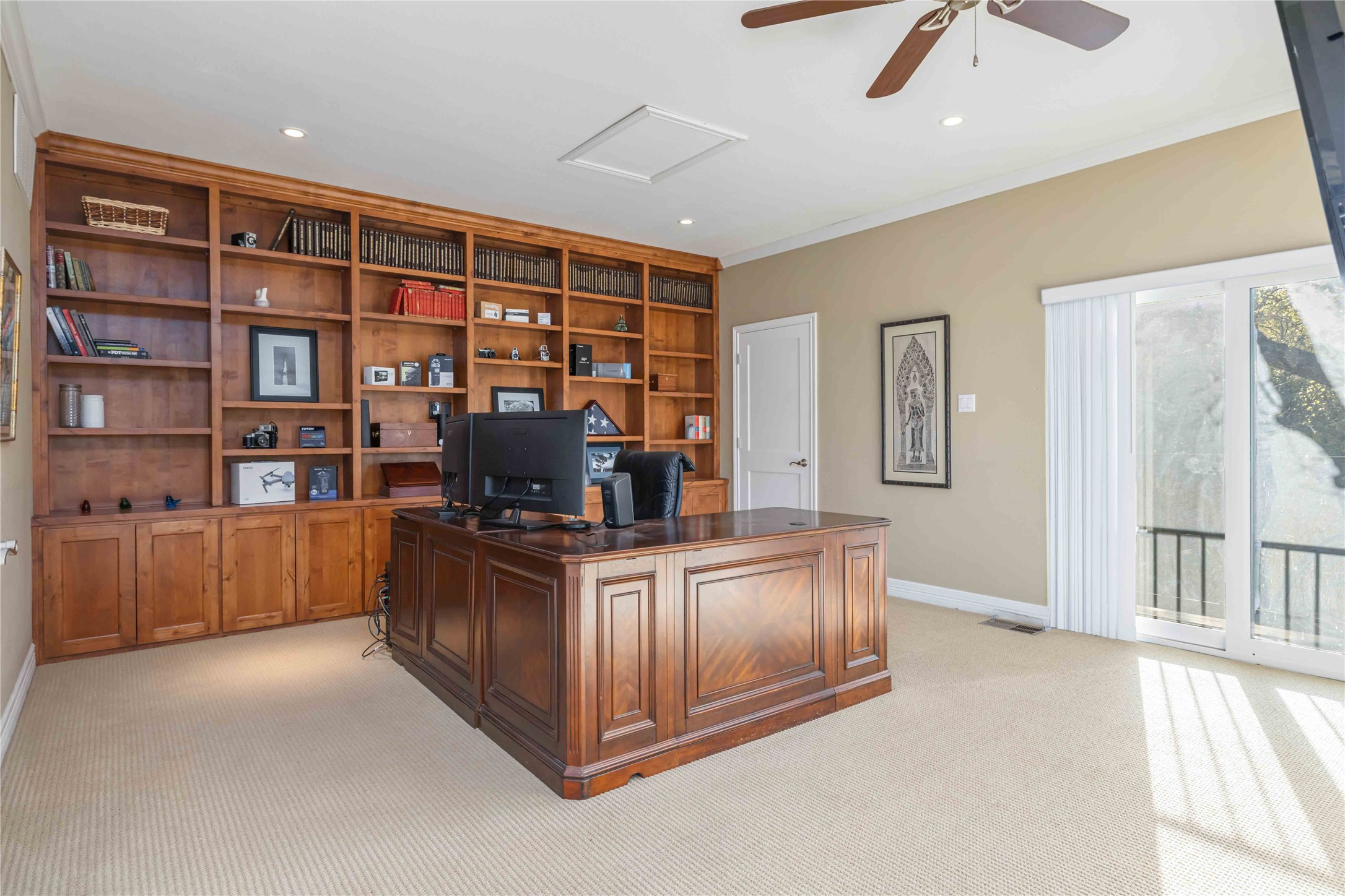 10903 Cade Circle Austin, TX 78726 - Photo 27 of 40 Office featuring light colored carpet, crown molding, recessed lighting, and a ceiling fan