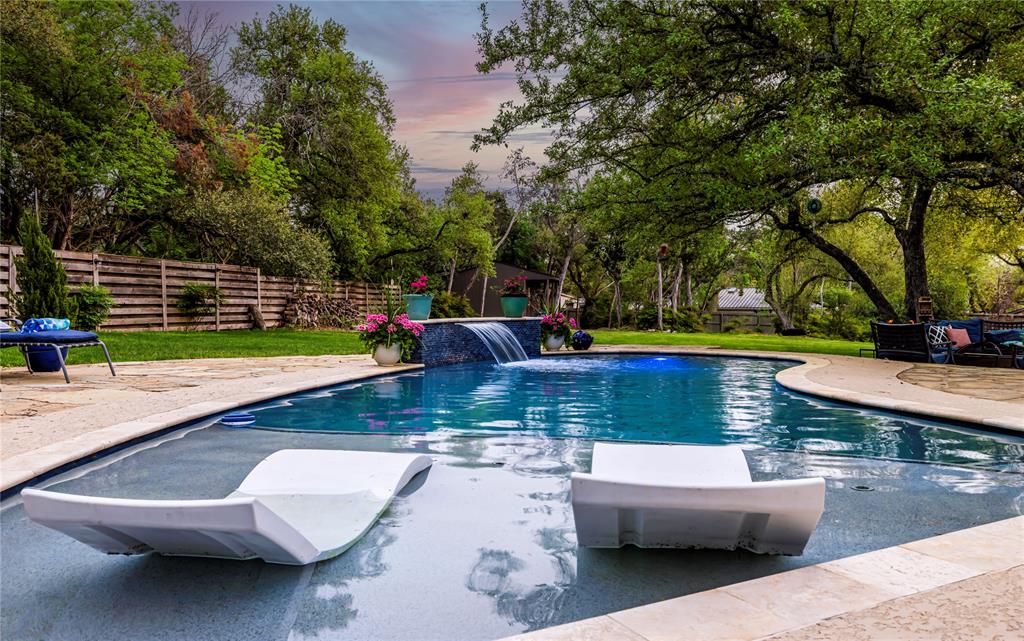10903 Cade Circle Austin, TX 78726 - Photo 3 of 40 View of pool featuring patio surround and view of scattered trees