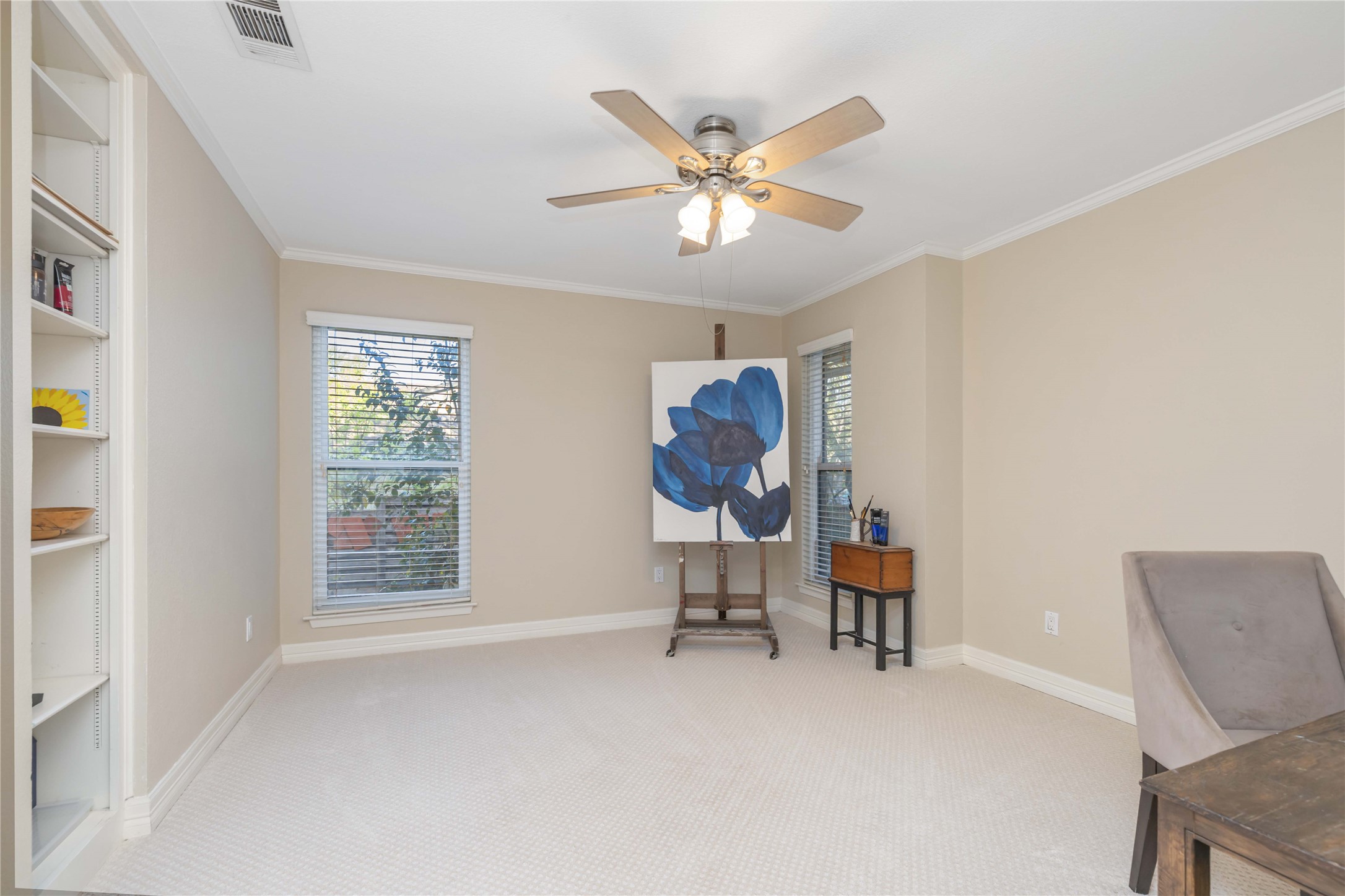10903 Cade Circle Austin, TX 78726 - Photo 34 of 40 Sitting room featuring light carpet, ornamental molding, and ceiling fan