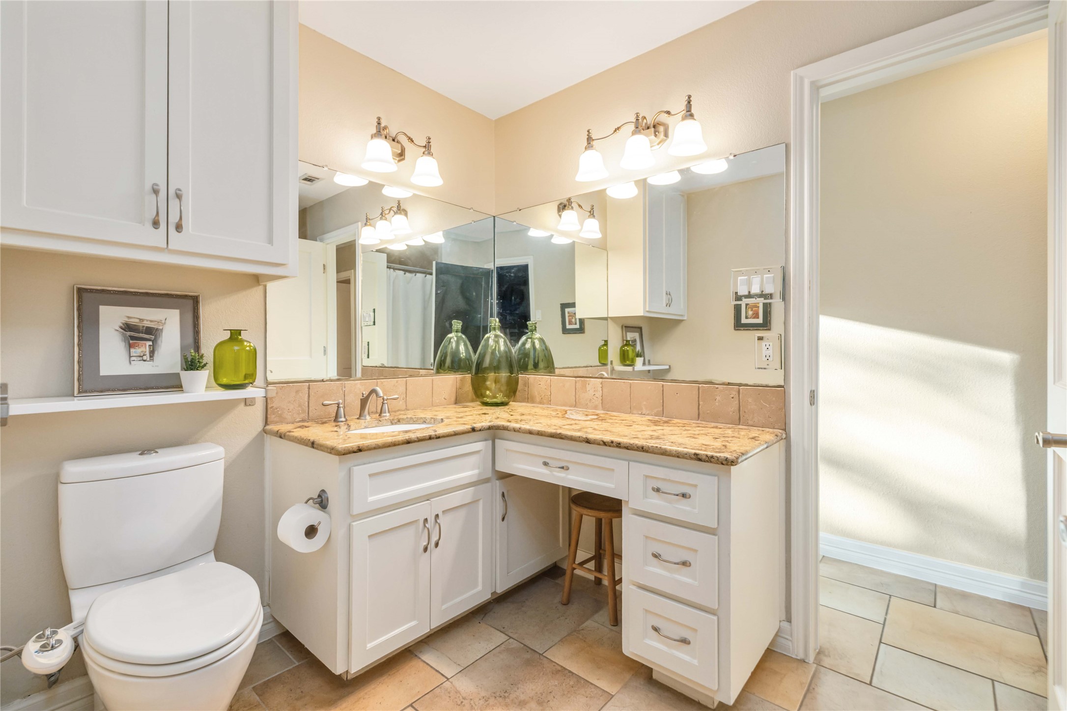 10903 Cade Circle Austin, TX 78726 - Photo 35 of 40 Full bathroom with vanity, a shower with shower curtain, and light tile patterned floors