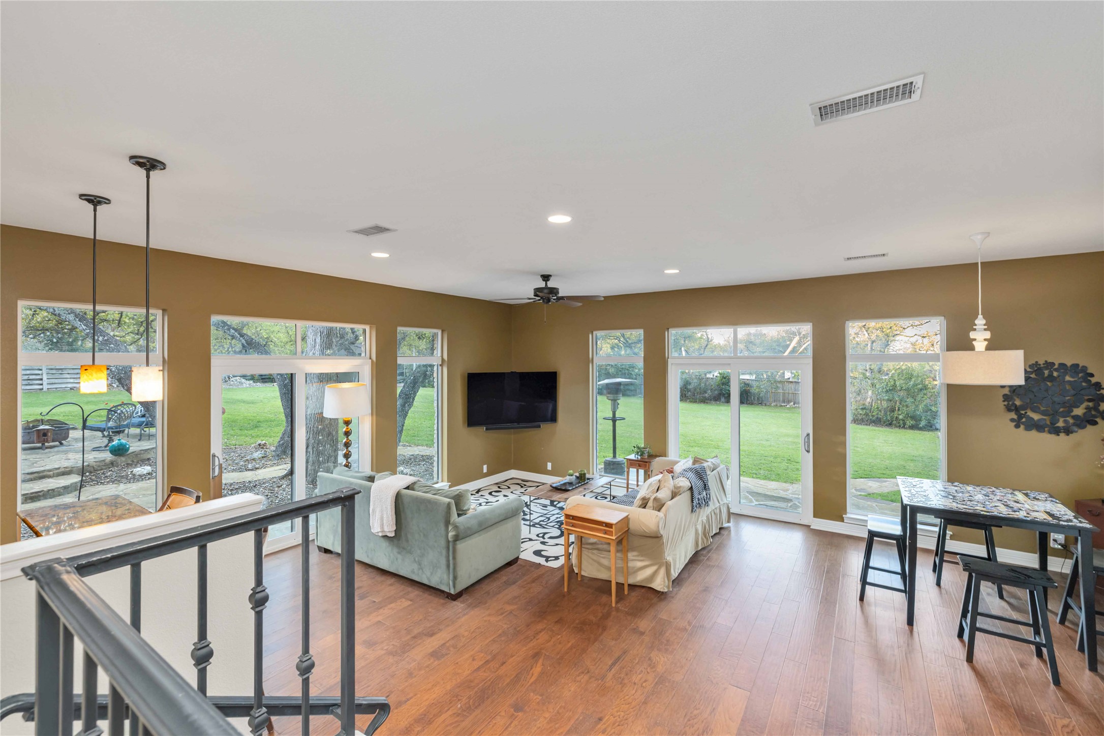 10903 Cade Circle Austin, TX 78726 - Photo 5 of 40 Living room with hardwood / wood-style flooring, plenty of natural light, ceiling fan, and recessed lighting