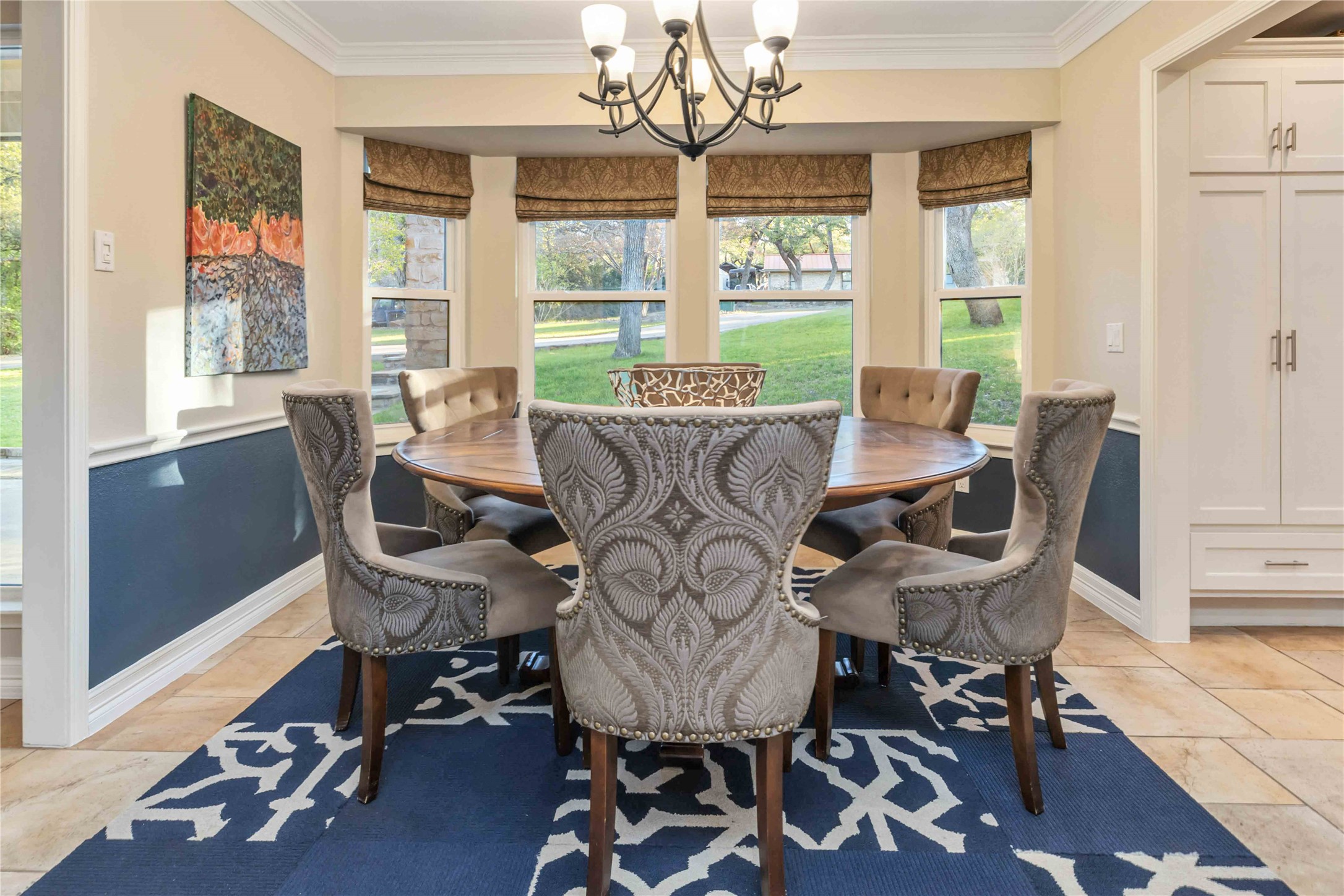 10903 Cade Circle Austin, TX 78726 - Photo 8 of 40 Dining area featuring plenty of natural light, suspended lighting, and ornamental molding